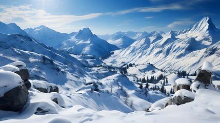 Wall Mural - Panoramic view of snowy mountains and blue sky. Beautiful winter landscape.