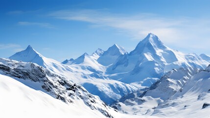 Wall Mural - Panoramic view of snowy mountains and blue sky. Caucasus, Russia
