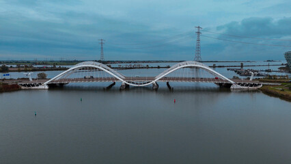 Wall Mural - Aerial drone view of modern Enneus Heerma Bridge Amsterdam Netherlands