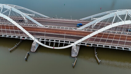 Wall Mural - Aerial drone view of modern Enneus Heerma Bridge Amsterdam Netherlands