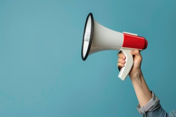 Poster - A person holding a red and white megaphone. Suitable for announcements and promotions