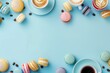 Border made of cups of coffee latte and colorful macarons on blue pastel background.	
