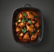 3D collection of chicken vindaloo with spinach in black bowl isolated on white on transparent background portuguese influenced indian dish made by cooking chicken in vindaloo spice