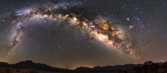 Wall Mural - a scenic view of the milky way galaxy and twinkling stars as seen from a roadside on a clear night