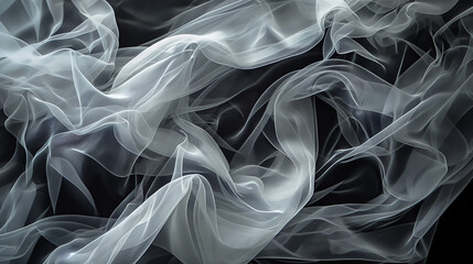 A high-contrast image depicting a delicate white sheer fabric that glistens and flows gracefully over a dark background