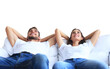 © ty - Relaxed young couple resting and dreaming about new home on comfortable sofa together on a transparent background