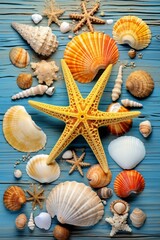 Canvas Print - Colorful seashells and starfish on a blue wooden background