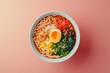 © Phuriphat - A bowl of ramen noodles with an egg on top