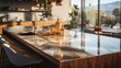 © Molang Visual - Modern kitchen island with marble top and copper accents