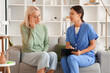 © Pixel-Shot - Ill mature woman with doctor at home