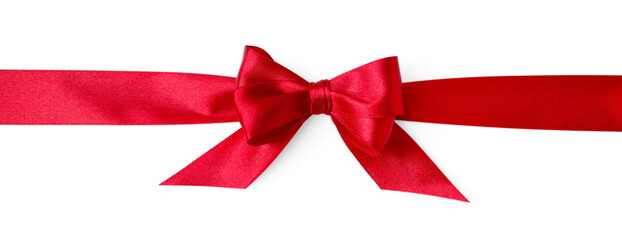 Red satin ribbon with bow on white background, top view