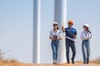 © BESTIMAGE - engineer team inspection check control wind power machine construction installation in wind energy factory. technician professional worker discussion check for maintenance electronic wind turbine
