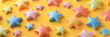 Gingerbread in the form of yellow stars on pink  gift with golden stars and yellow background. 

