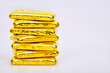 Close up photo a gold bars on white background