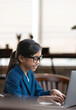 © Cheangchai - Female student uses a laptop to search for information. Girl is studying online.