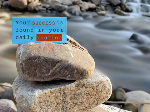 Your success is found in your daily routine on paper with nature background. Inspirational motivational quote.