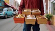 © Daisha - young food delivery person Various paper containers for take-out food.AI generated image