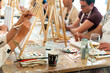 © Alfonso Soler - Painting workshop. Students drawing on a blank canvas.