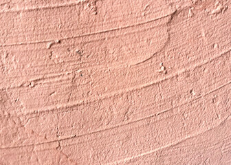 Wall Mural - old pink plaster on the wall abstract background