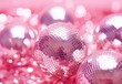 Indoors, shiny disco balls toned pink, space for text