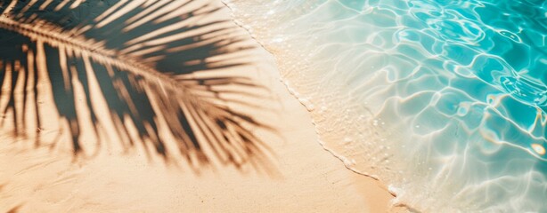 Wall Mural - Abstract background with palm shadows on the water in tropical beach