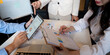 © Natee Meepian - Business team talking planning analyze investment and marketing on tablet, collaboration discussing working analyzing with financial data and marketing business strategy project in office