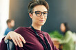 Woman, portrait and creative designer in office with confidence for company, campaign or entrepreneur. Female person, face and glasses at startup in Australia for agency about us, business or career