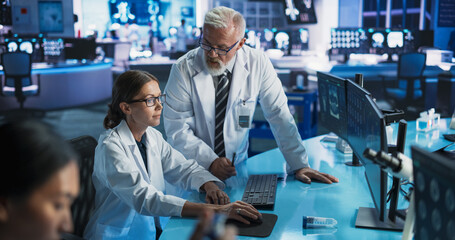 Poster - biotechnology research laboratory: two caucasian doctors discussing ct brain scan on computer. focus