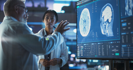 Poster - Neuroscience Laboratory Meeting: Female Asian Scientist And Male Surgeon Discussing MRI Brain Scan On TV Display. Specialists Working On Medication For Rehabilitation After Brain Damage