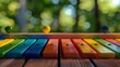 A wooden xylophone with bright, cheerful keys, waiting to be played