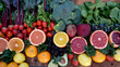 Assorted fresh fruits and vegetables on wooden background.