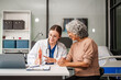 © NanSan - Caucasian woman and elderly Asian woman discuss health issues cold, influenza, pneumonia, bronchitis, stomach disease, GERD, IBS, inflammatory bowel disease, gallstones, chronic constipation