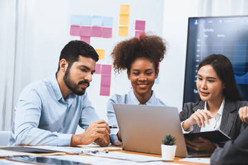 Wall Mural - Multiracial analyst team use BI dashboard data to analyze financial report on meeting table. Group of diverse business people utilize data analysis by FIntech for success business marketing. Concord