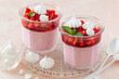 strawberry mousse dessert in glass with meringues