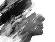 A young woman's profile disappearing into paint strokes in paintography