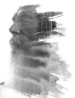 A paintography double exposure portrait of a bearded man with closed eyes