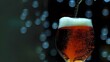 Closeup of beer being poured in a glass at a modern pub . Concept Food and Drink, Lifestyle, Urban Scenes, Nightlife, Modern Pub