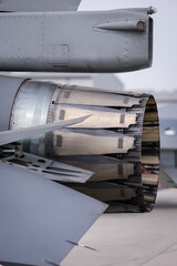 Sticker - Fighter jet exhaust nozzle detail on a lot of fighter airplanes in parking position.