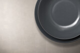 Fototapeta Paryż - empty grey dish on background