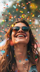 Poster - A woman wearing sunglasses and confetti in the air