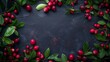 Vibrant composition of fresh red cherries with green leaves on a dark textured background.