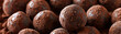 Silky Smooth Chocolate Truffles: Close-Up of Velvety and Textured Chocolate Truffles in Dessert Display