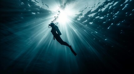 Sticker - A serene underwater scene with a scuba diver ascending towards the light rays penetrating through the ocean.