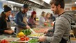 © NDmCX-Nic - A group of people are preparing food in a commercial kitchen.