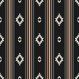 Fototapeta Do przedpokoju - Western aztec geometric stripes pattern. Vector aztec geometric colorful stripes seamless pattern southwestern style. Ethnic geometric pattern use for fabric, textile, home decoration elements, etc.