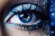 Open expressive blue eyes with frost or snow on eyelashes macro close-up in winter Bright sensual ex