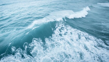 Wall Mural - pale blue sea surface with waves splash white foam and bubbles at high tide and surf abstract background