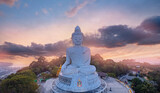 Fototapeta  - Aerial top view Big Buddha statue on hilltop of Phuket Thailand on sunset