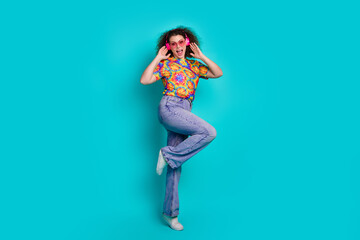 Wall Mural - Photo of crazy positive nice girl wear stylish print clothes have fun weekend isolated on cyan color background