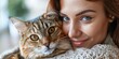 © Влада Яковенко - Portrait of a beautiful woman hugging a cat